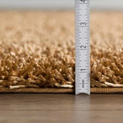 Lavish Beige Shag 8 ft. x 10 ft. Area Rug by Addison Rugs -TrafficMaster Decor Store beige addison rugs area rugs hdlh69be8x10 c3 1000