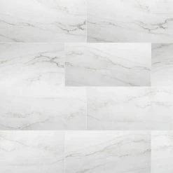 12 in. W x 24 in. L Calacatta Consilio Rigid Core Click Lock Luxury Vinyl Tile Flooring (66-case/1278.42 sq. ft./pallet) by TrafficMaster