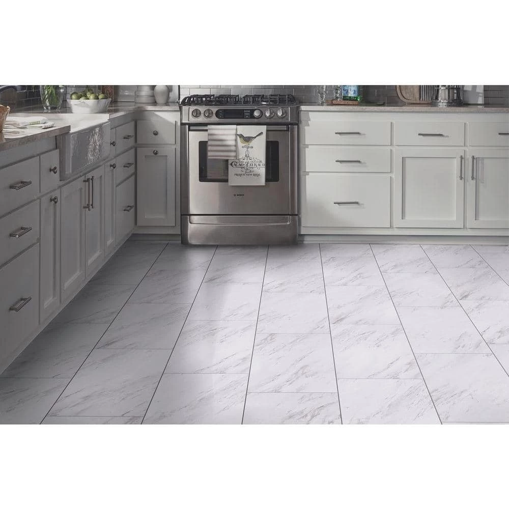 Carrara Marble 12 in. x 24 in. Peel and Stick Vinyl Tile (20 sq. ft. / case) by TrafficMaster 4 Carrara Marble 12 in. x 24 in. Peel and Stick Vinyl Tile (20 sq. ft. / case) by TrafficMaster - Image 2