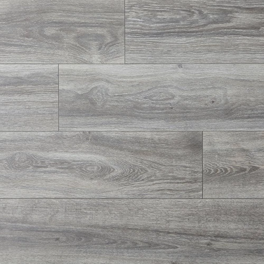 Silverton Oak 8 mm T x 7.48 in. W Water Resistant Laminate Wood Flooring (23.69 sq.ft/Case) by TrafficMaster 3 Silverton Oak 8 mm T x 7.48 in. W Water Resistant Laminate Wood Flooring (23.69 sq.ft/Case) by TrafficMaster